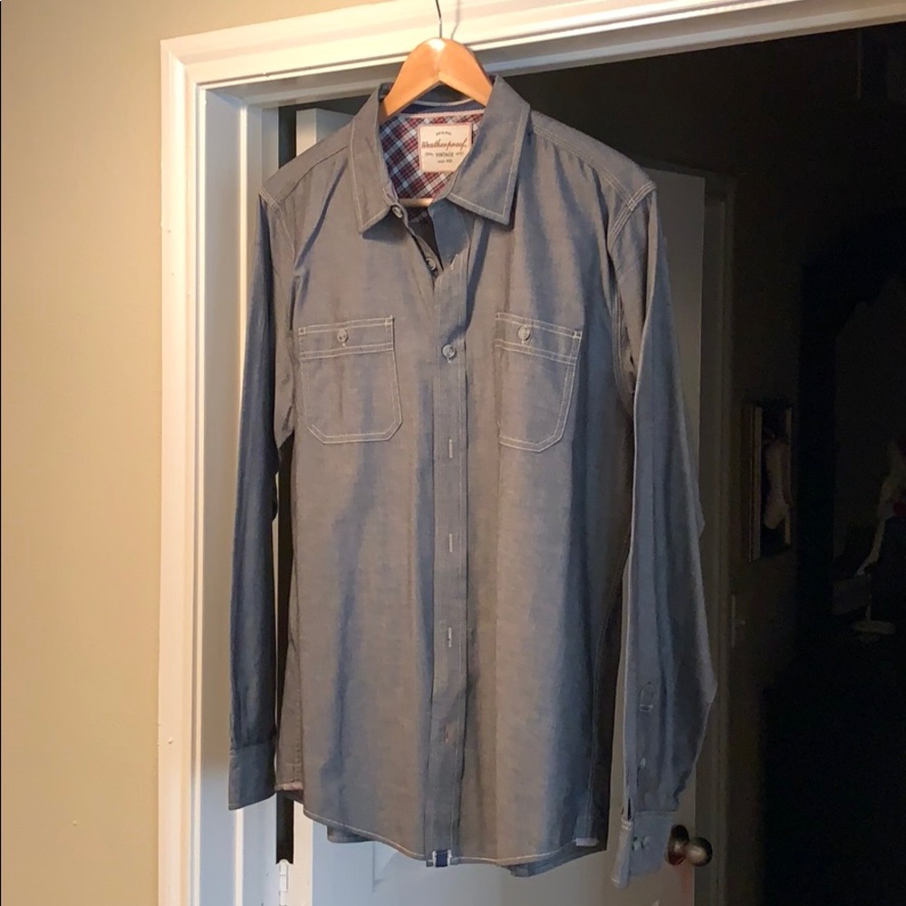 Long sleeve button up shirt.